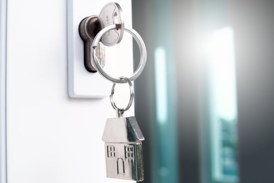 House Key  Plugged into the Door of New House